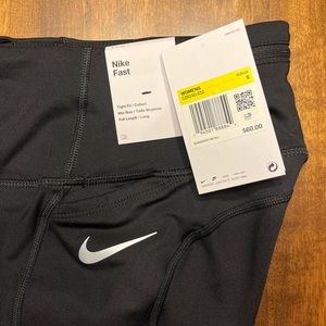Nike. Tight Fit. Mid Rise. Full Length. Running.